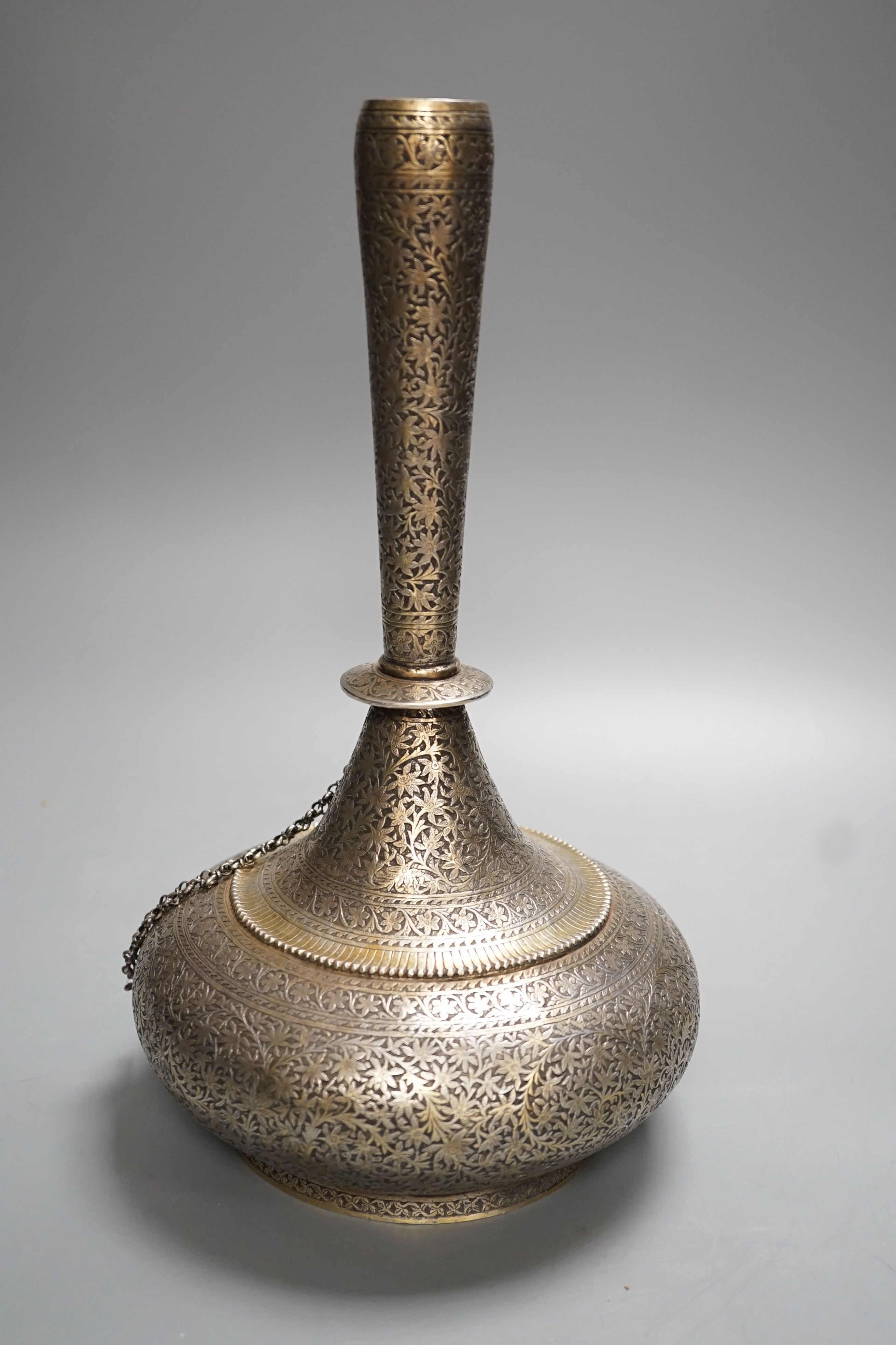 A 19th century North Indian silver surahi with engraved shawl decoration 30cm